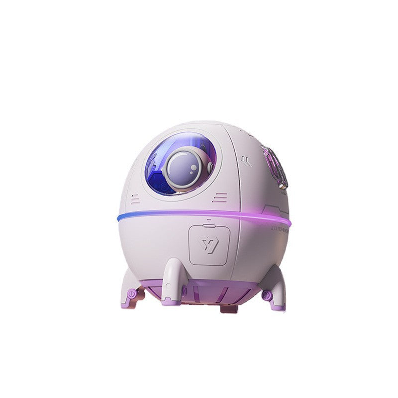 An isolated studio shot of the closed purple space capsule mist maker featuring a glowing LED light band.