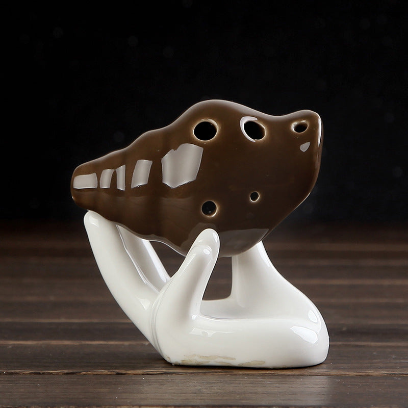 Oceanic Mysticism: The Handcrafted Conch Shell 6-Hole Pottery Ocarina