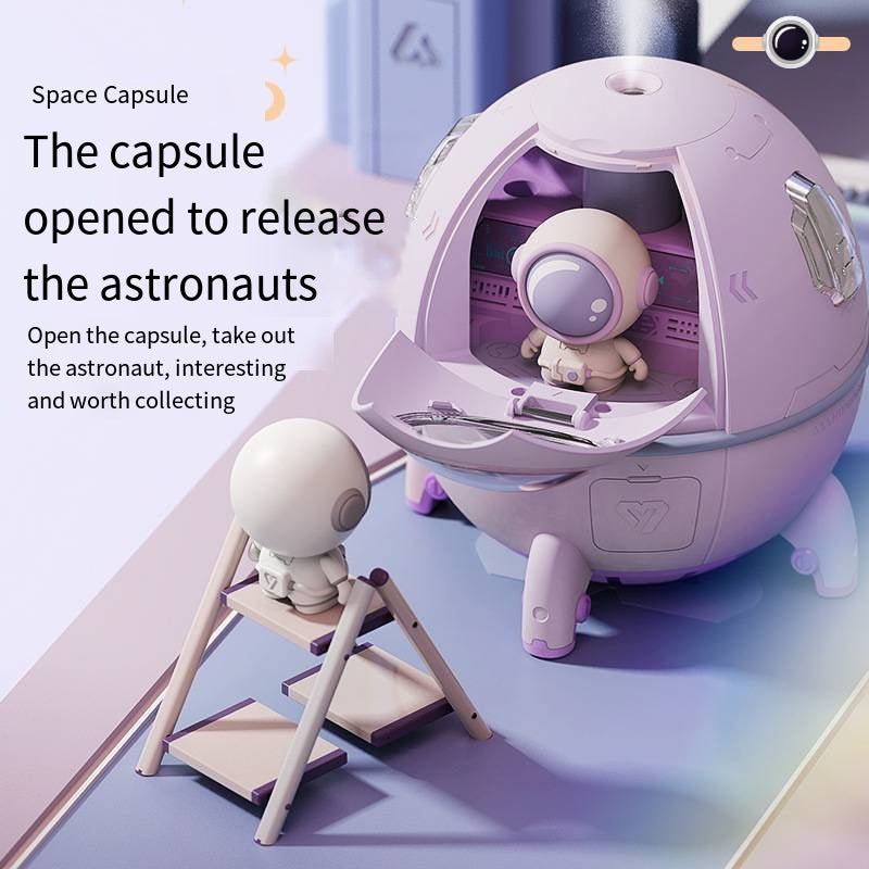 An open space capsule humidifier with text highlighting the collectible, removable toy astronaut feature.