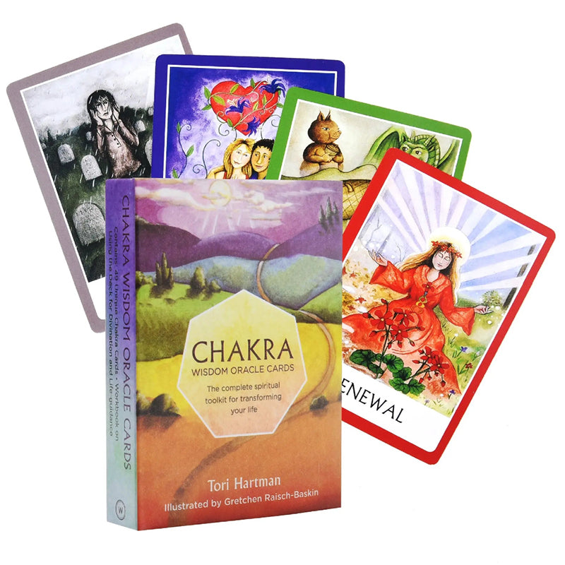 Chakra Wisdom Oracle box set designed by Tori Hartman showcasing four fanned-out oracle cards with multi-colored borders. A card with a red border displays a whimsical watercolor illustration titled Renewal, accented by a bright sunburst motif behind a seated figure.