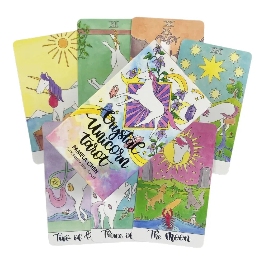 Fanned-out Crystal Unicorn Tarot cards under a central box cover showing pink, purple, and green pastel illustrations.