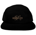 Black five-panel camper style hat featuring the elegant Anakha H Nyx calligraphy script logo embroidered in a warm copper bronze tone across the front.