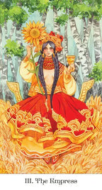 Slavic-inspired tarot cards showcasing intricate traditional rural costumes and vivid orange color tones.