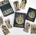 The Medieval Feathers Tarot random display with box, cards and guidebook