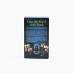 Back view of the Witches Tarot box on a white background. The text reads "Enter the World of the Witch" in yellow script, followed by a description of the deck's Rider-Waite-Smith basis and artwork by Mark Evans. Small preview images of the cards and the companion book are displayed at the bottom.