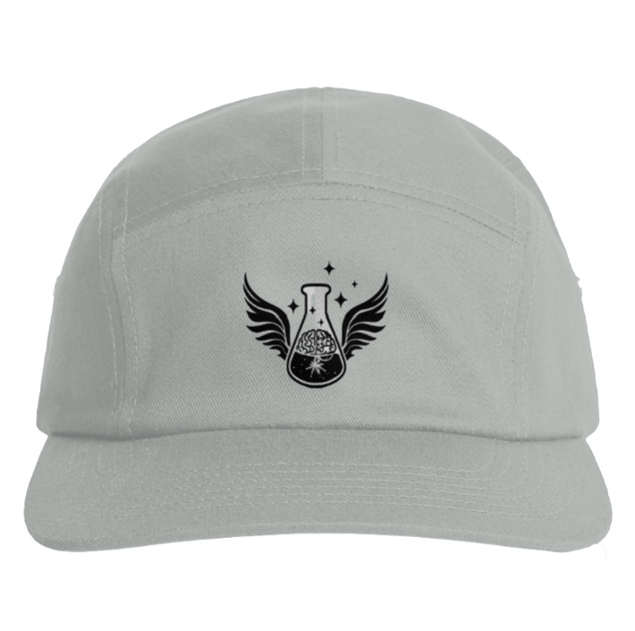 A front view of a light grey "storm" five-panel camper style hat sitting isolated on a white background. Centered on the front panel is a sharp black embroidered emblem featuring a chemical flask beaker flanked by outspread black wings, displaying an illustrative human brain root design inside the fluid matrix under small black celestial stars.
