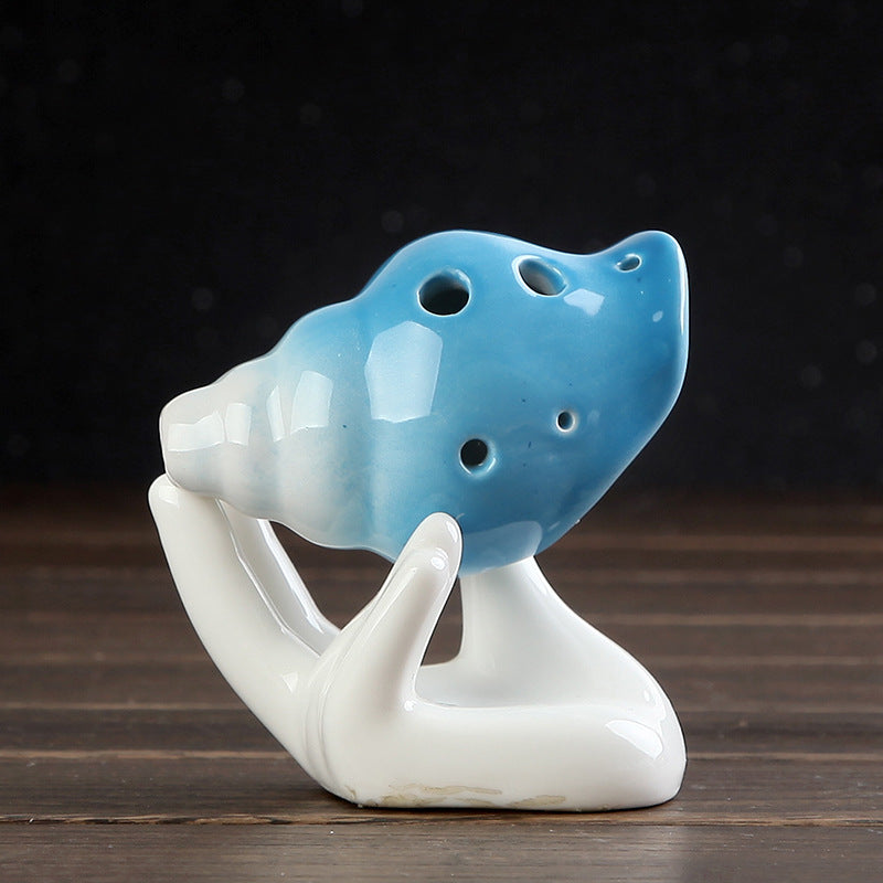 Oceanic Mysticism: The Handcrafted Conch Shell 6-Hole Pottery Ocarina