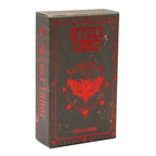 Side view of the black and red Occult Tarot tuck container detailing author credit for Travis McHenry.