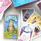 Unlock the secrets of the past, purr-esent, & future w/ the Cat Tarot & Guidebook Anakha H. Nyx