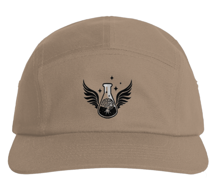 A front view of a khaki five-panel camper style hat sitting isolated on a white background. Centered on the front panel is a black embroidered logo depicting a science beaker or flask flanked by large black wings, featuring an illustrative human brain root system graphic inside the beaker surrounded by small black stars.