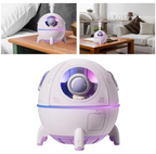 A composite product image showcasing the TOPINCN mini spaceship humidifier in residential settings. The purple capsule cool mist humidifier is displayed isolated at the bottom, on a wooden bedroom nightstand at the top left, and on a coffee table in a modern home living room layout at the top right.